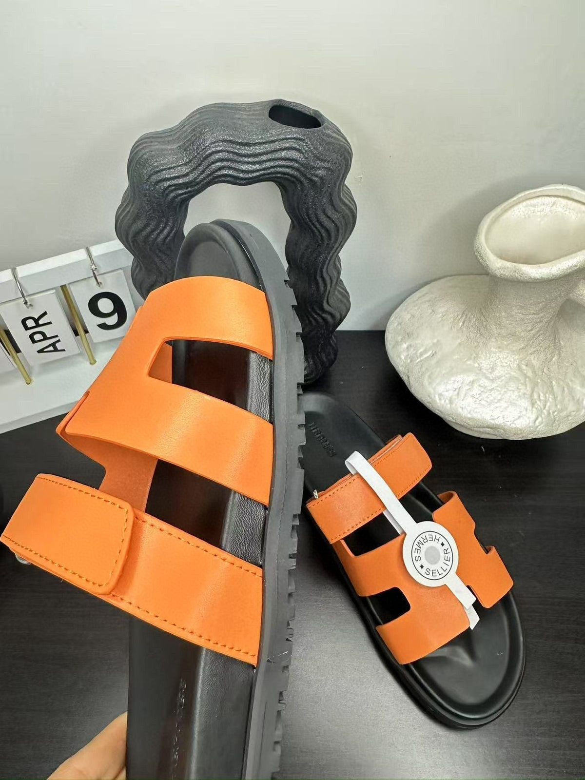 Hermès Orange Interwoven Slide Sandals - Orange and Black